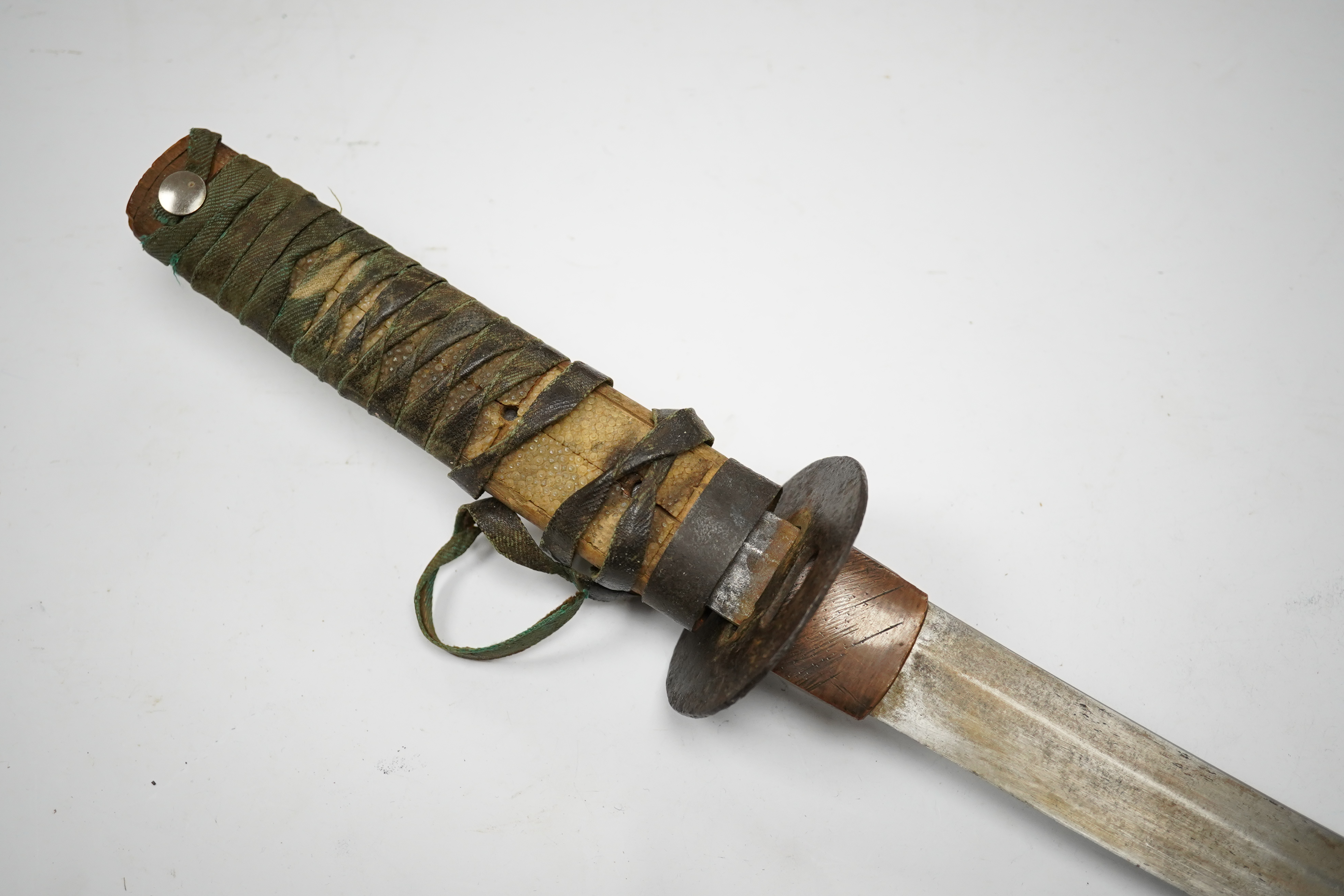 A Japanese sword wakizashi blade 42.8cm signed, iron tsuba, tape bound tsuka, no scabbard. Condition - fair.